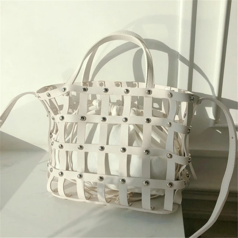 

Women hollow out bag brand large capacity handbag fashion Cool girl rivets weave shoulder bag summer beach travel PU tote bags