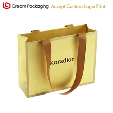 Фабричный поставщик Текстура золотой цвет на заказ Роскошная брендовая сумка для покупок с логотипом с корсажной лентой
