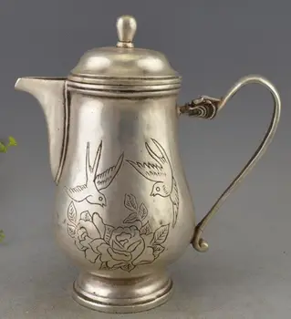 

Chinese Tibet Silver Copper Handwork Carved Birds & Flowers Teapot
