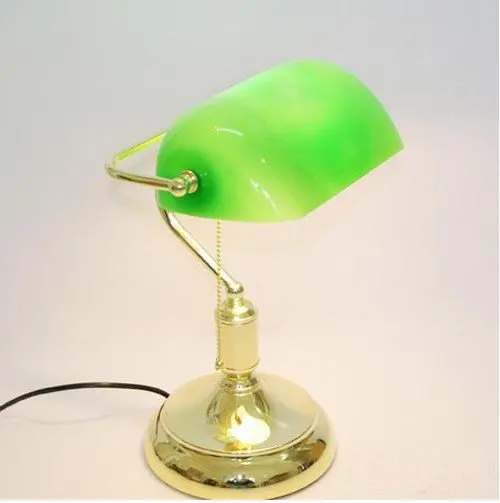 brass lamp with green glass shade