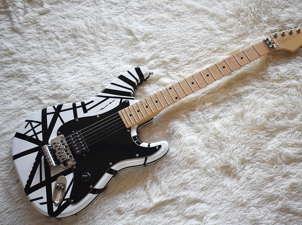 

Factory White Electric Guitar with Black Strips,Double Rock,Maple Fretboard,H Pickup,Black Hardwares,Can be Customized
