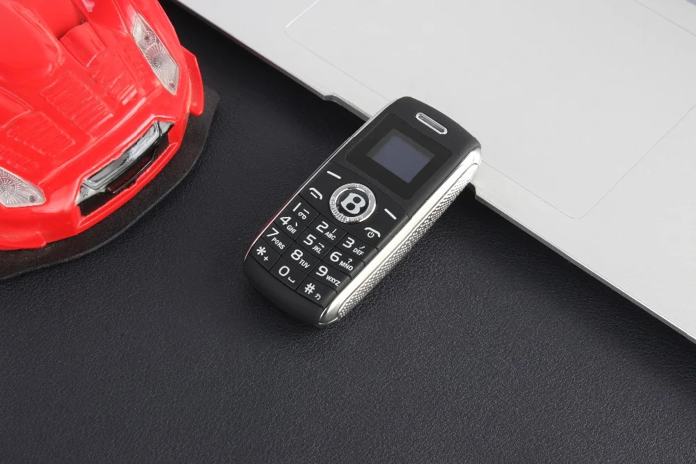Карман мини-телефон ключи от машины Fsmart V8 маленький Bluetooth номеронабиратель MP3 волшебный голос Dual SIM карты супер маленький мобильный телефон