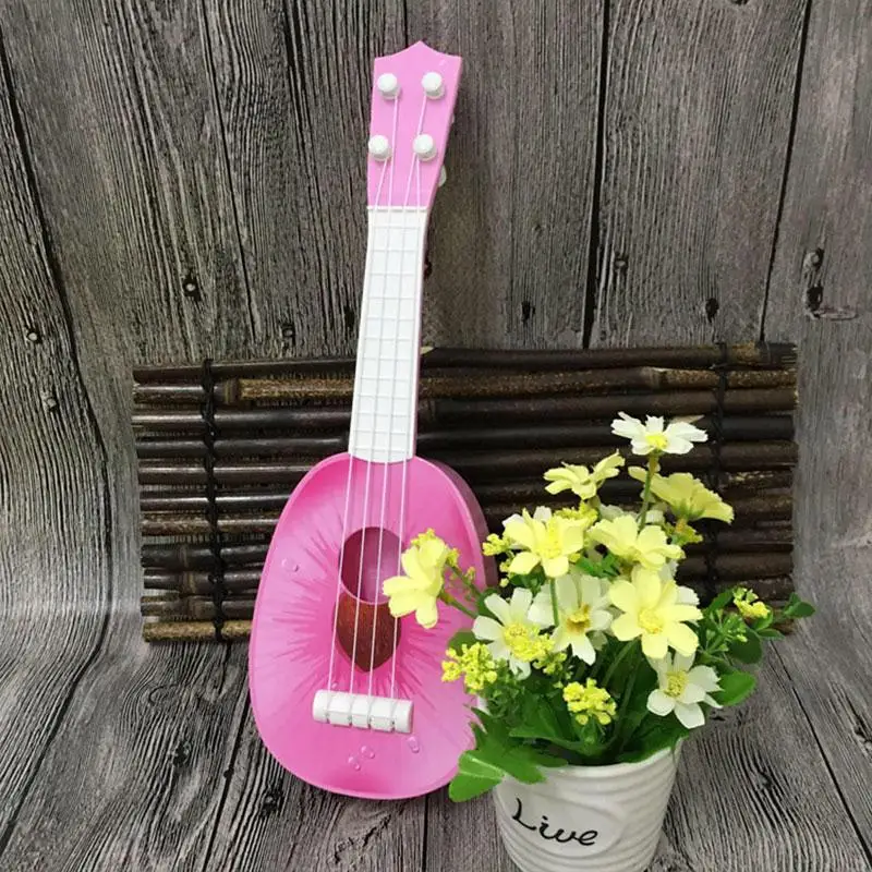 32 см дети учатся гитара 4 струны Гавайские гитары милые мини фрукты могут играть простые музыкальные укулеле игрушки подарки - Цвет: Peach