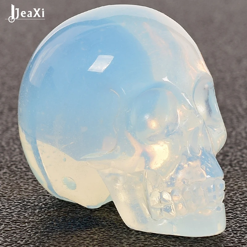 

1 pcs 2 inch Handmade opalite Crystal Carved Skull statue Realistic Feng shui healing ability of the Stone Home Ornament