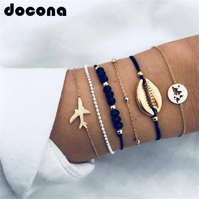 

docona Boho Shell Map Airplane Shape Layered Bracelets Set for Women Girl Black Beaded Pendant Bracelet Bangles Set 6812