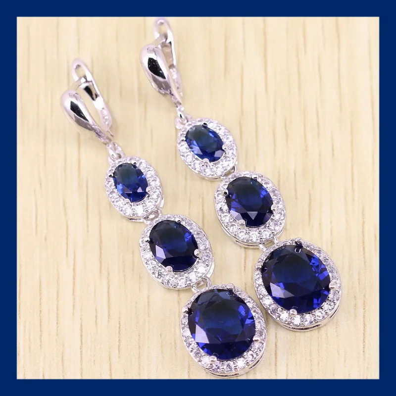 

Reginababy 925 stamp New Arrival White crystal Blue stone zircon Silver color Jewelry Women Long Drop Earring