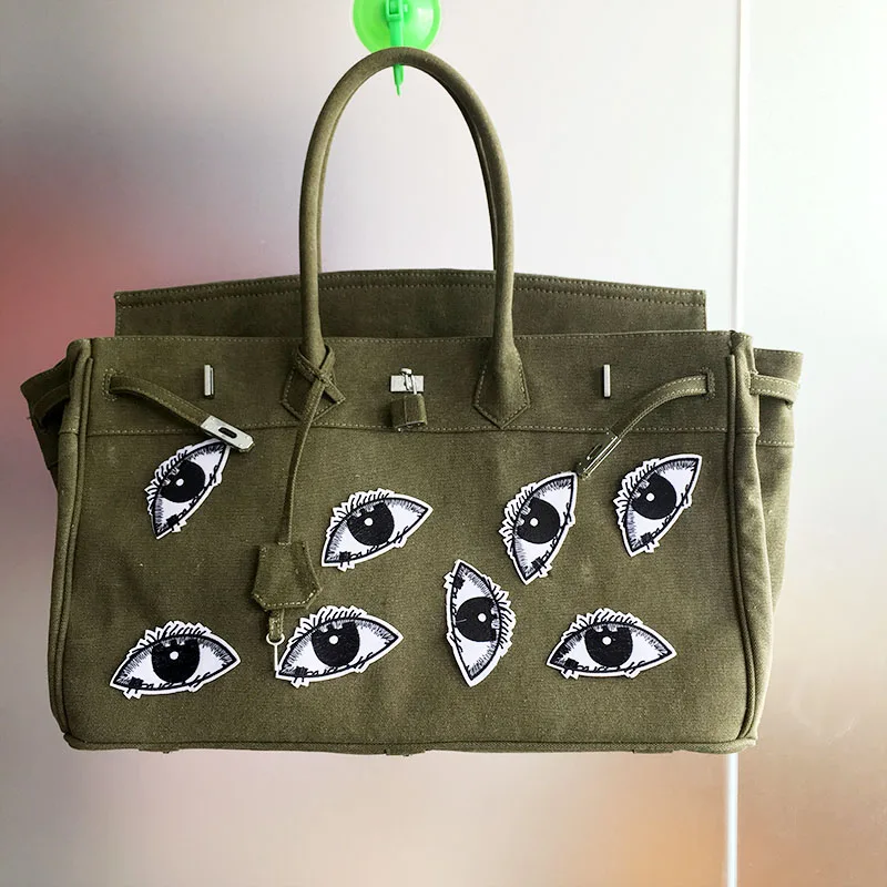 

2018 New Women Canvas Tote Lots Eyes Wings Lock Hasp 18' large bag Design Luxury Bolsa Feminina Designer Handbag Messenger Bags
