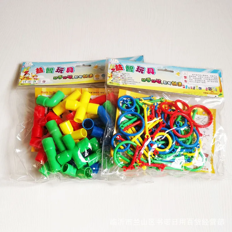 

Bagged with magic sticks and large granular plasticfor children's puzzle toys
