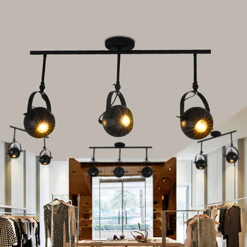 

Simple modern American character LED tube lighting track lights clothing spotlights spotlights backdrop restaurant