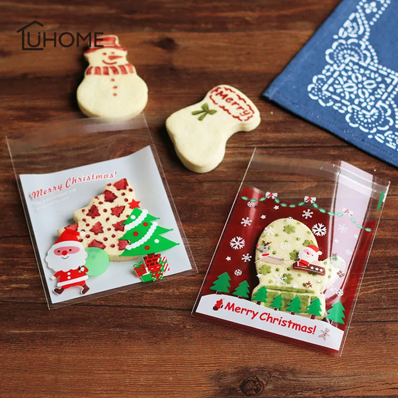 

100pcs/lots Snowflake Snowman Santa Festival Christmas Gifts Bags Holders Bake Biscuit Cookies Candy Bag Cake Packaging Bags