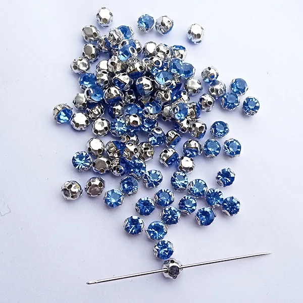Rhinestones in claw