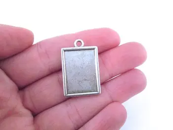 

Silver plated rectangle settings (holds a 15x21mm cab), pick your amount, B111theof