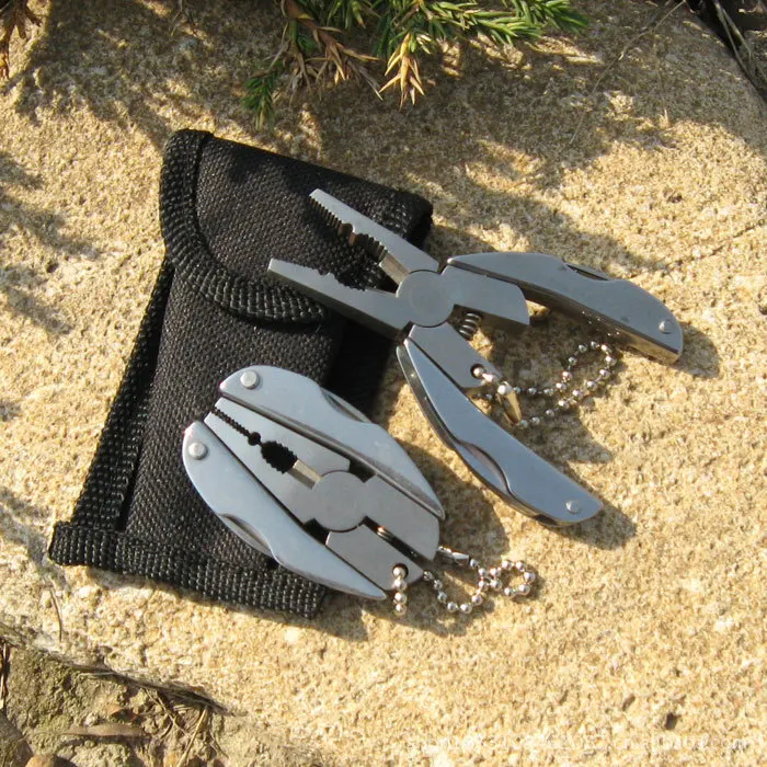 

Multipurpose Camping Survival Folding Pocket Plier Multifunctional EDC Adjustable Outdoor Hunting Screwdriver Wrench Jaw Knife