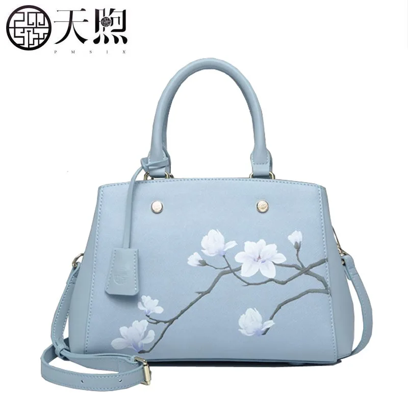 light blue tote handbag