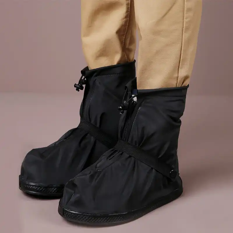 clear plastic rain boots over shoes