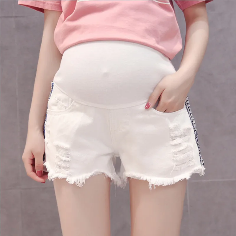 Летние облегающие шорты для беременных, белые джинсовые шорты с дырками, модные шорты с боковой лентой для беременных женщин