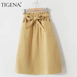 Tigena Миди-юбки Для женщин мода лето 2019; бант; карман линия Высокая талия юбка женский по колено школьная юбка цвет желтый, синий; размеры 34–43