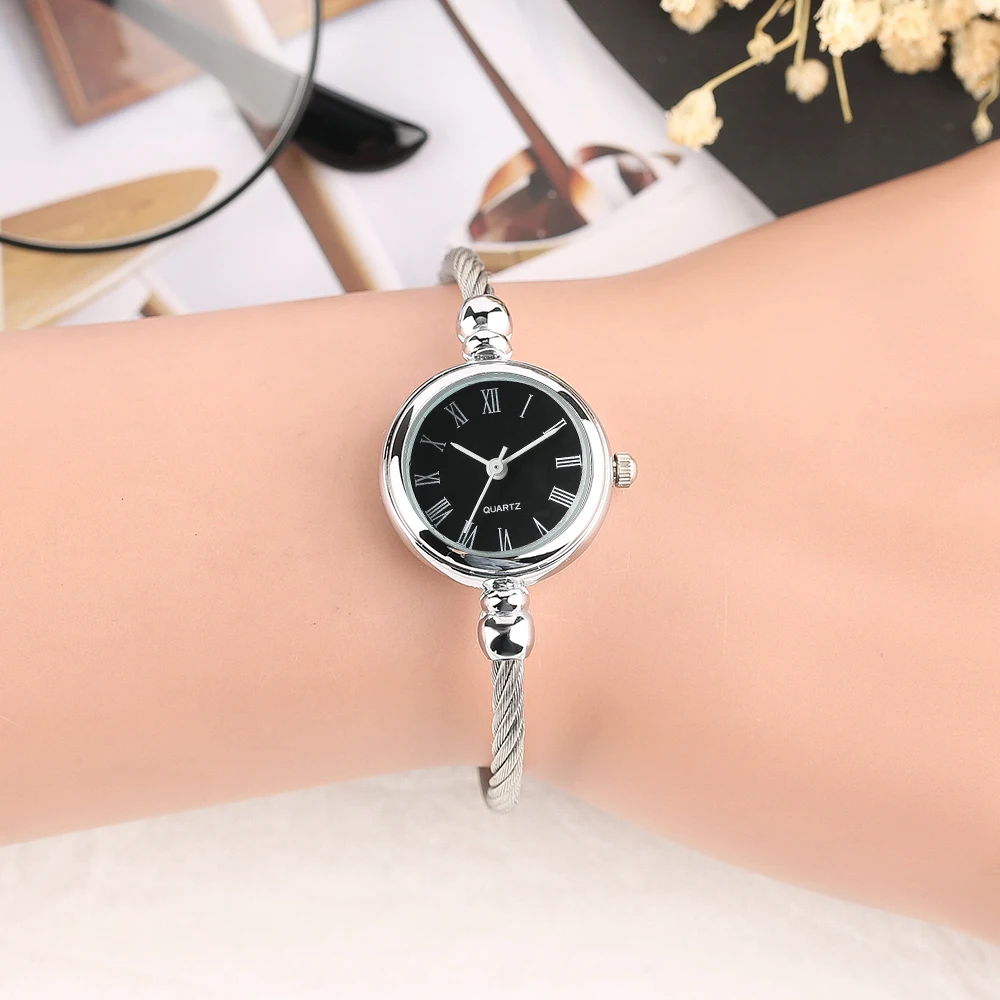 Elegant 2018 New Arrival Women Bangle Watch Roman Number Dial Quartz Wrist Watch Simple Rotating Twist Stainless Steel Band (15)