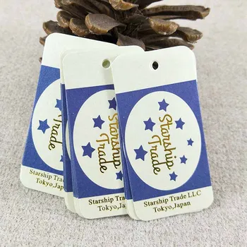 

2017 4x8cm Hang Tag Customzied & Golden Logo Beige Pearl Paper 1LOT =1000 PCS Free Shipping By China Post