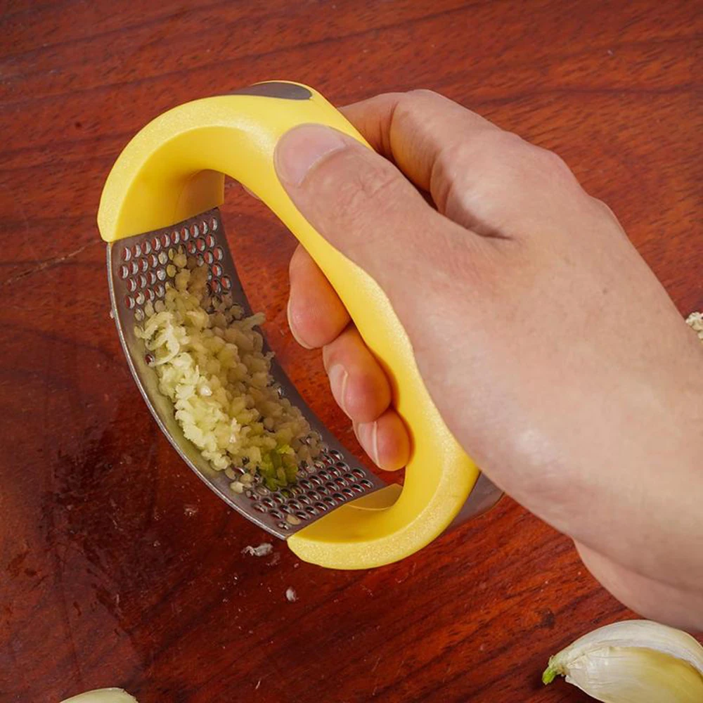 

Yellow Stainless Steel Garlic Presses Manual Garlic Mincer Chopping Garlic Tools Curve Fruit Vegetable Tools Kitchen Gadgets