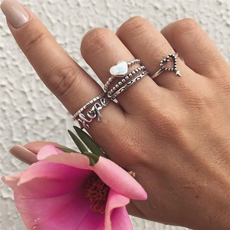 

pack of 6 creative vintage knuckle rings with heart /cross and letter hope embossed design in silver tone
