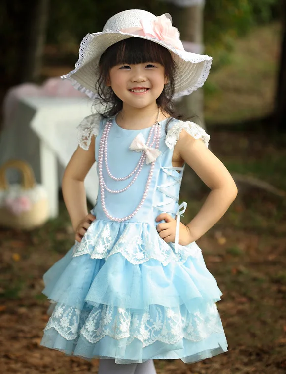 cute baby girl in blue dress