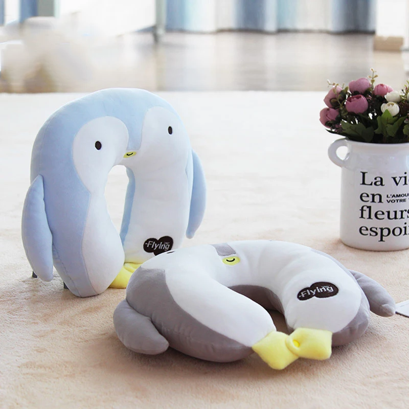 

Creative cartoon U shaped pillow and travel pillow neck lovely penguin Plush toy doll pillows sleep and travel neck pillow
