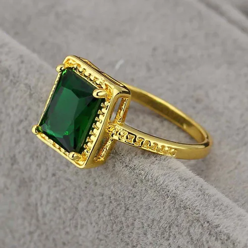 green stone gold ring design for female