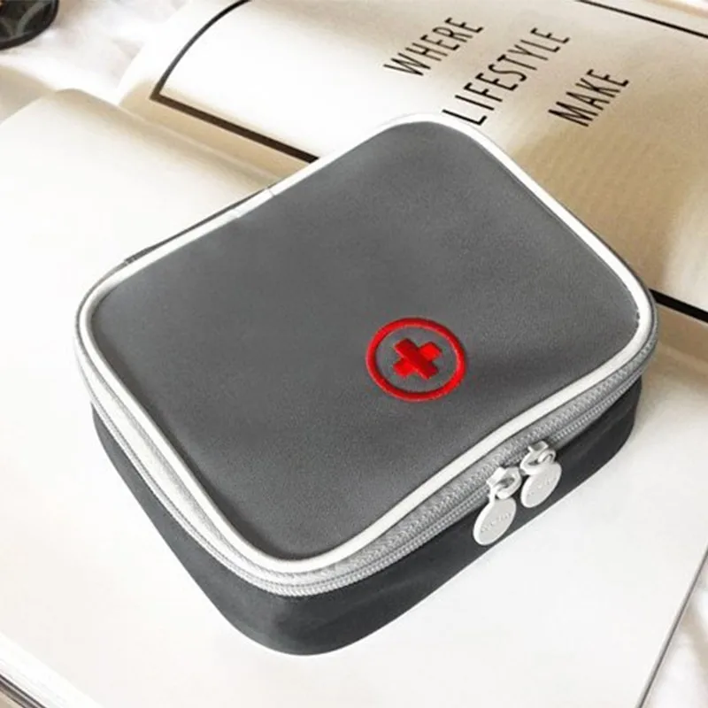 Portátil de viaje de moda Mini medicina bolsa de Kit de primeros auxilios al aire libre Camping viaje casa supervivencia Kit médico