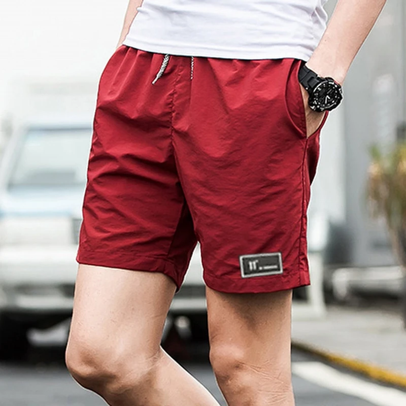 New Shorts Men Summer Beach board shorts Hot Sale Casual Short Male Solid Quality Elastic Fashion Fast Dry Short S-5XL 1007 - Цвет: Красный