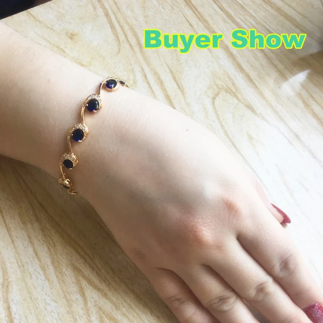 peach stone flower design golden chain bracelet Rakhi for womens | Buy  Online Bracelet Rakhi