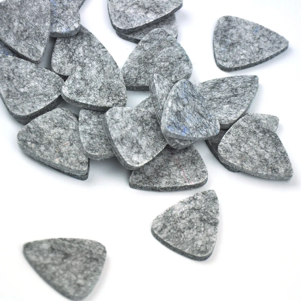 

Wholesale 100pcs/lot Natural Wool Felt 3mm Guitar Picks Plectrums for Ukelele