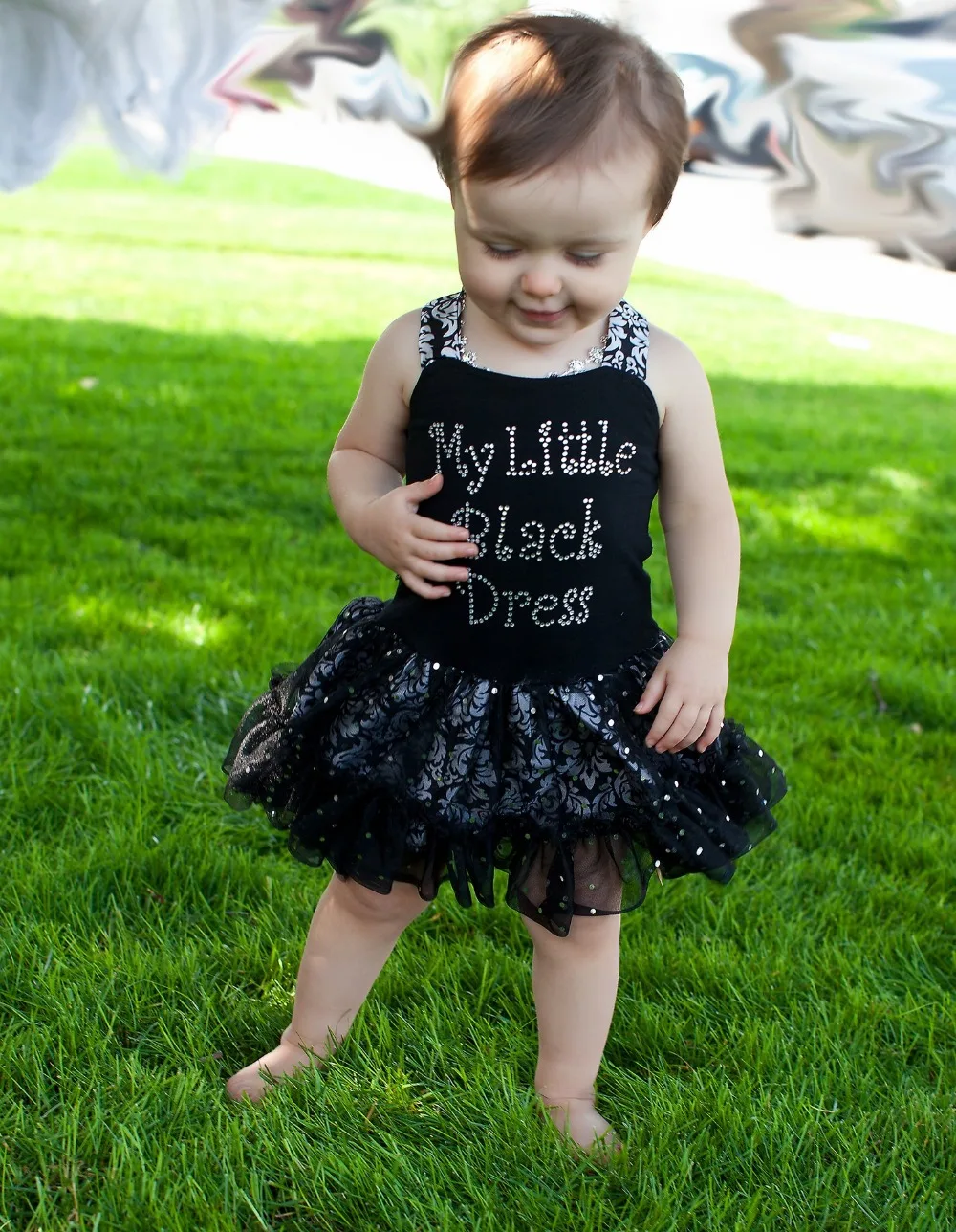 Black baby girl dress cute black and white outfit, cute hair pretty, cute necklace, really cute kid! When I have a girl hopefully. Find this Pin and more on Beautiful black kids by Lita Rhai. New Baby Girl If only I could have rocked on this when I was a kid. really cute kid!
