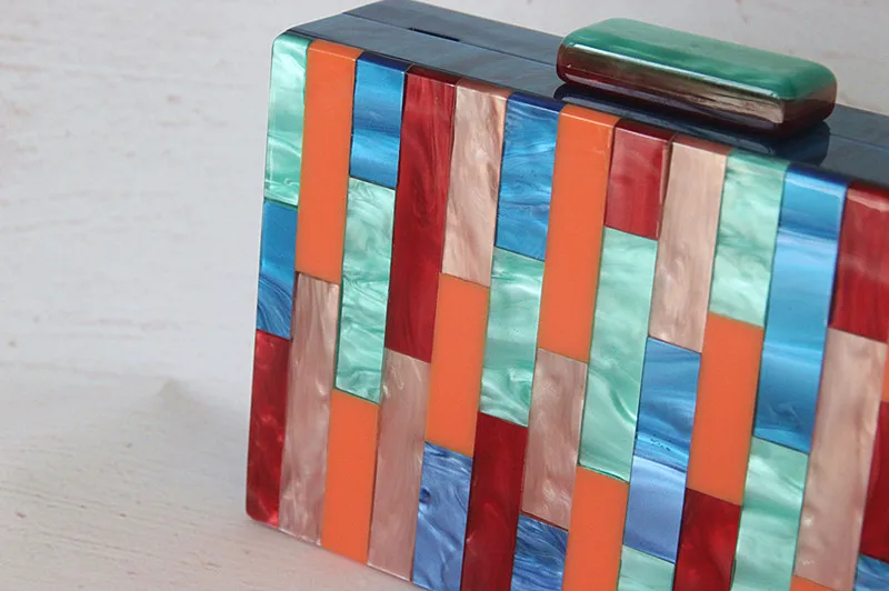 7_Luxy Moon Spliced Color Striped Acrylic Clutch Bag Surface Detail View
