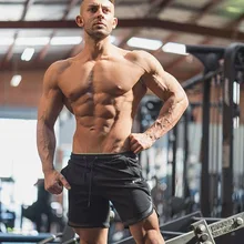 Мужские спортивные хлопковые шорты бег трусцой спортивные Фитнес Бодибилдинг пот Штаны мужской профессии тренировки брендовые укороченные штаны