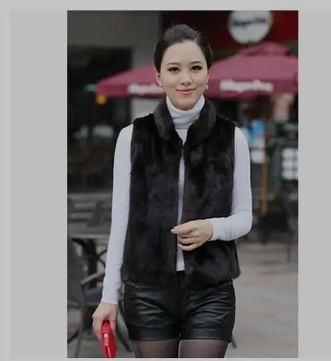 short black fur vest