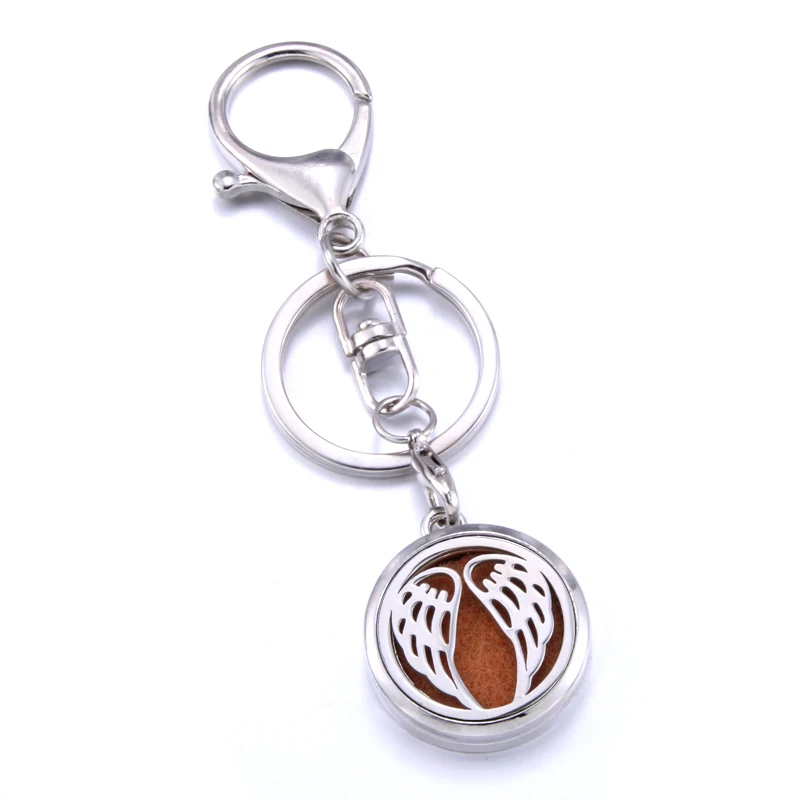 

wing pattern Magnetic Aromatherapy key chain Jewelry Perfume Locket Pendant Essential Oil Diffuser keychain Dropshipping