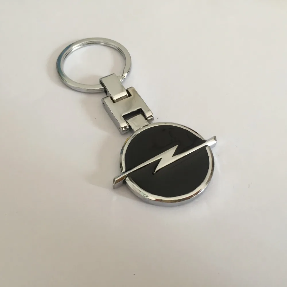 

1pcs Car Key Ring Car logo Emblem Keychain key chain badge car styling for Opel Astra Mokka Insignia Zafira Corsa Tigra