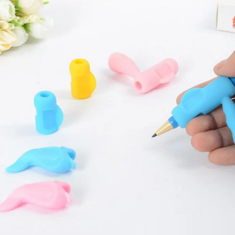 Silicone loops Hold a pen device writing posture correction Topper