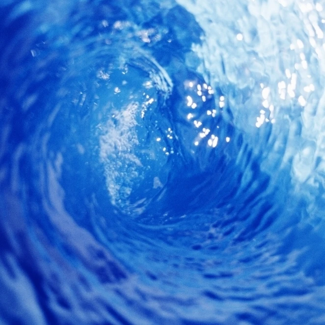 View From Inside Tube Of Wave  Circular Pattern  Sun Reflections In The Blue Water Poster Print (22 x 34)
