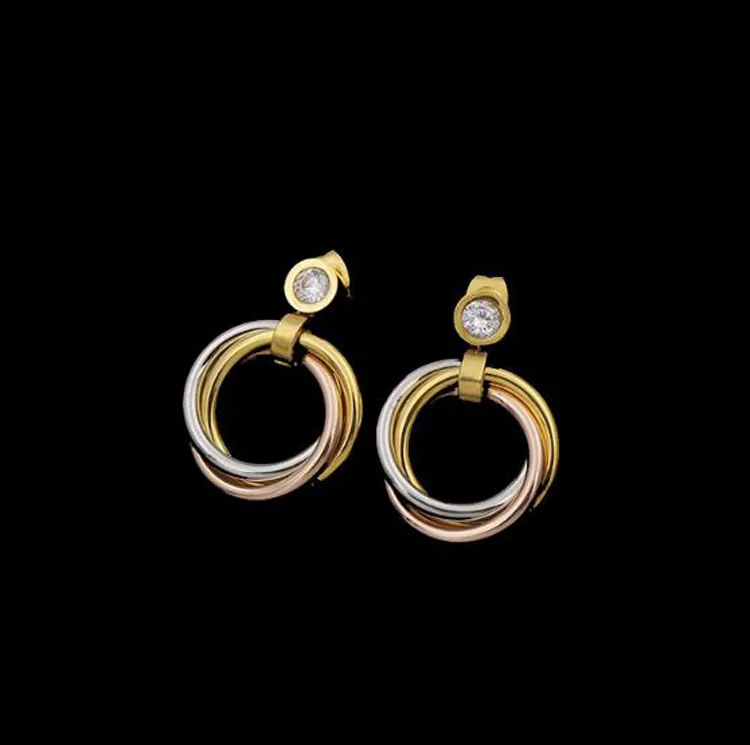 

Fashion Simple Tricolor Steel Circle Earrings Inlay Single CZ Crystals Platting Gold Tricyclic Stud Earrings Jewelry for Women