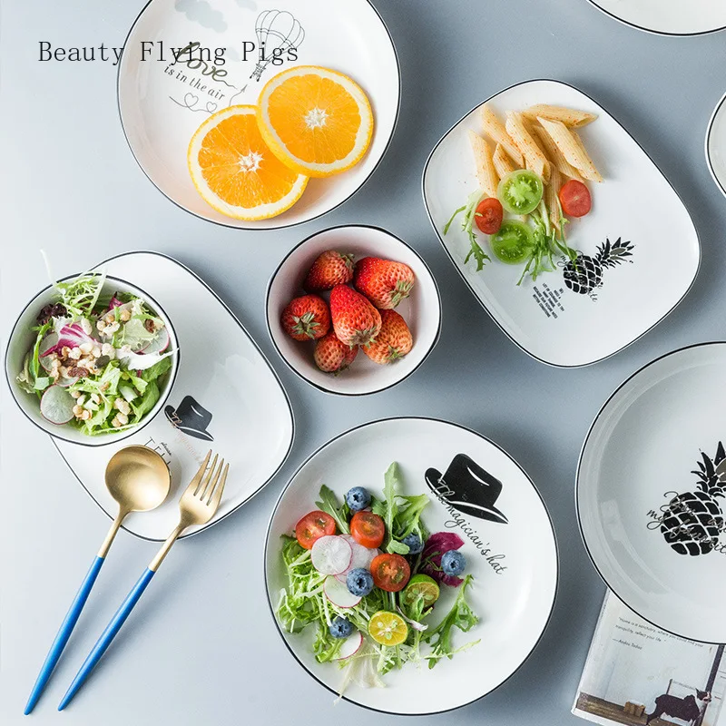 

Ins style ceramic breakfast plate oval black side plate ceramic plate English alphabet snack sushi dish dessert salad plate