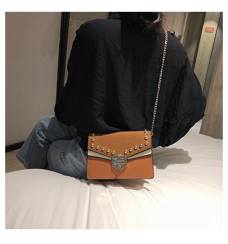 Retro rivet bag design sense lady bag clamshell PU leather lady crossbody bag chain bag new bag