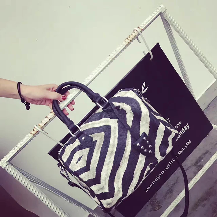 

Women's bags 2017 zebra skin pattern cylinder bucket bag women's handbag messenger bag tote