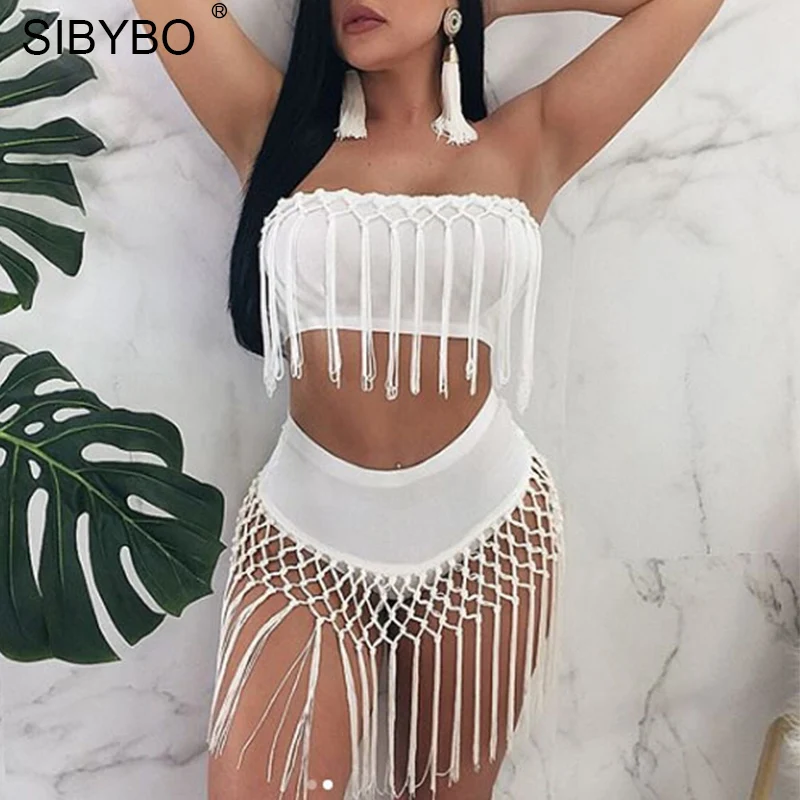 Sibybo النساء Bodycon ارتداءها 2 أجزاء مجموعة المحاصيل أعلى مثير قبالة الكتف الشرابة ثوب فضفاض للمرأة بذلة 2018 الصيف الشاطئ وزرة