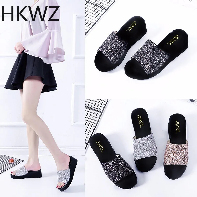 

Rhinestone women's sandals summer brand new fashion wear casual thick bottom wedge with wild word drag slip non-slip shoes 5.5cm