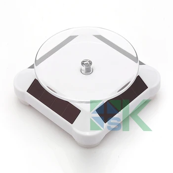 

1pcs Popular souvenir coins holder rack Fashion solar power 360 degree rotating display stands for home decoravtive 4 colors