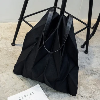 

Niche design female new tote Miyake origami series canvas bag
