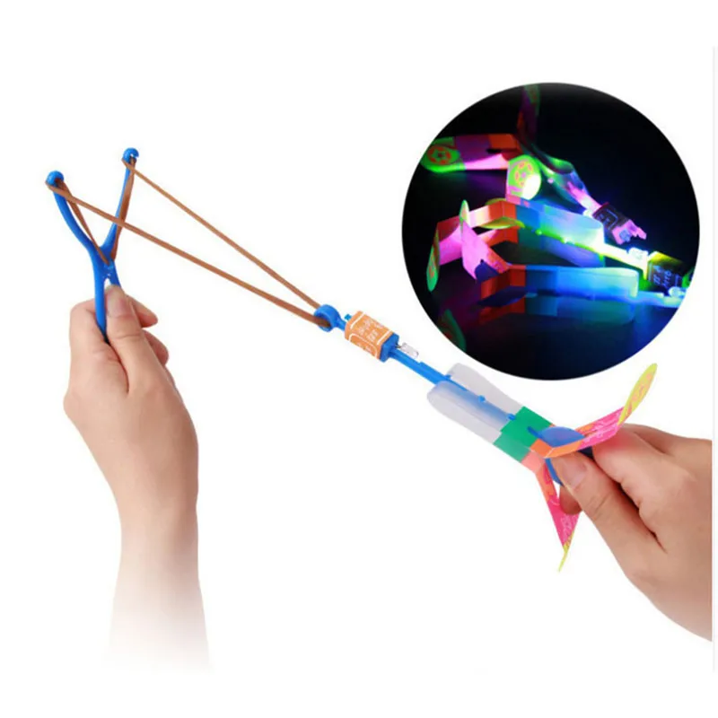 Amazing LED Light Arrow Rocket Helicopter Rotating Flying Toys Party