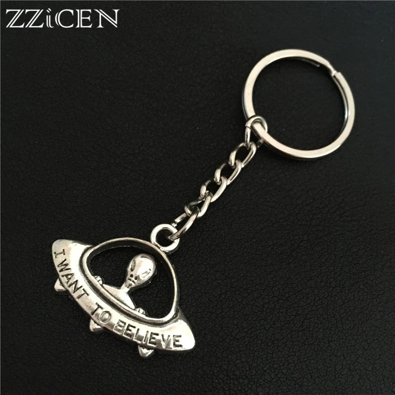 

Personality Antique Silver I want to believe UFO Keychain ET Alien Keyring Spaceship Key Chain Ring Car Purse Pendant Jewelry